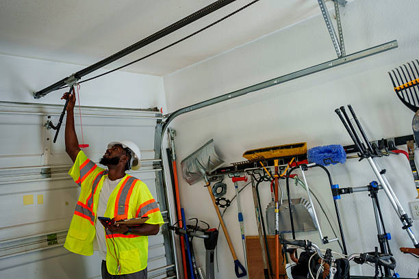 Professional Garage Door technician working in Pine Manor, FL